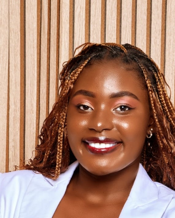Professional portrait of Sharon,a female orthopaedic specialist with braided hair